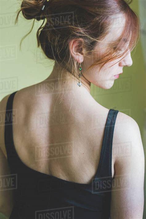 woman looking back over shoulder